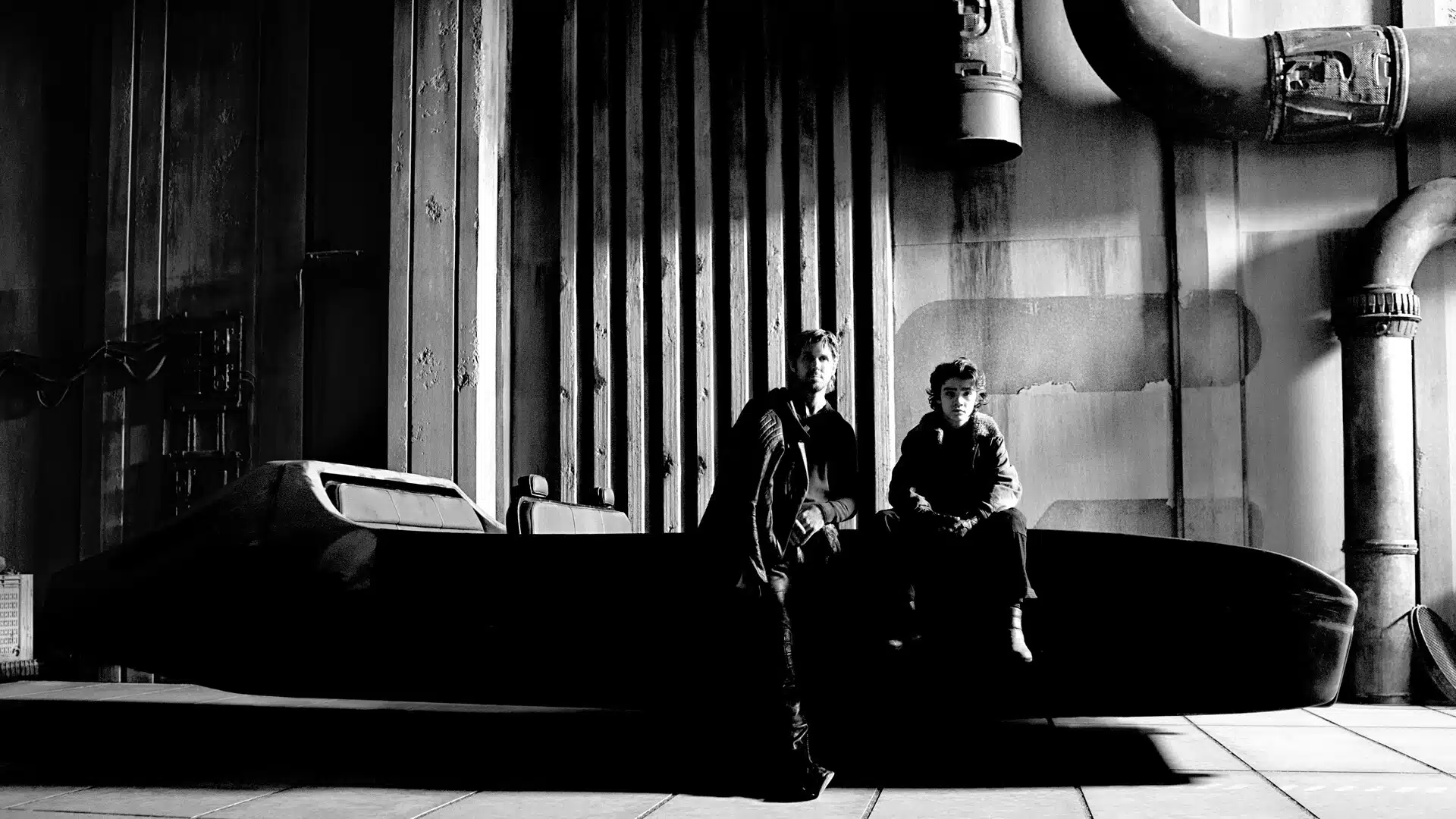 Photo en noir et blanc de Ryan Gosling et Flynn Gray sur un speeder.